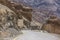 Empty road through HImalayas mountains in Ladakh, Northern India