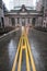 An empty road leading to Grand Central Station in New York City on a rainy morning.