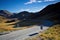 Empty road through mountains in New Zealand