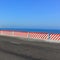 Empty road - ocean and blue sky background