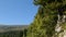 Empty road running in mountains, mountain top covered in rocks, nature, sequence