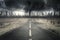 Empty road with thunderstorm at sky