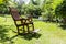 Empty rocking chair over grass