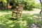 Empty rocking chair over grass