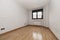 Empty room with aluminum window with views, French oak parquet flooring