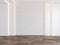 Empty room with blank brick wall, hidden light, parquet wood floor.
