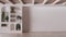 Empty room interior design in white and beige tones with copy-space. Bleached wooden ceiling and parquet floor. Shelves and niches