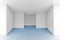 Empty room interior with white walls and blue floor