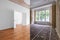 Empty room, luxury apartment / flat in old building with wooden floor and stucco
