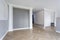 Empty room with minimal preparatory repairs with crown molding. interior of white and gray walls