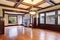 Empty room with wood paneled walls and coffered ceiling.