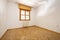 empty room with wooden carpentry in windows