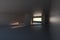 Empty rough room with light coming in from the window, 3d rendering