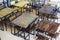 Empty rough wooden table top and wooden chair in cafe or cafeterias