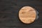 Empty round wooden pizza platter