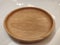 The empty rounded wooden tray