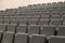 Empty rows of comfortable grey seats cinema or theater