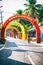 empty rural Indian road decorated with bright colorful flags for hindu holiday