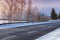 Empty rural road with information sign