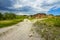 Empty rural road through mountain clifs