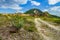 Empty rural road through mountain clifs