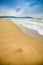 Empty sand beach in Paestum in cloudy day in winter, Cilento, Italy