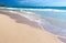 Empty sandy beach with footsteps in sand