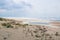 Empty sandy sea coast seaview, cloudy colorful sunrise skyview