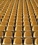 empty seats. modern stadium. yellow tribunes. seats of tribune on sport stadium.