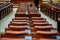 Empty seats and very few MPs in a Romanian Parliamentâ€™s Chamber of Deputies Meeting during the covid-19 lockdown