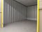An empty self storage unit room