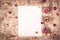 Empty sheet of paper and dried roses. Blank note on wooden background. Dried roses and petals. Copy space.