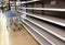 Empty shelves at a supermarket due to stockpiling during the coronavirus pandemic