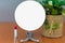 Empty Shiny Modern Metal Round Make Up Mirror On Wooden Table White Blank Advertisement Banner Mock Up Isolated