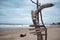 Empty signage of city distance at the beach