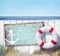 Empty Signboard and Wooden Fence on Beach