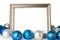 An empty Silver Picture Frame with Blue and Silver Christmas Ornaments