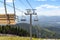 An empty ski lift during summer at the Mt Spokane State Park ski resort overlooking Spokane, Washington.