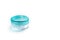 Empty small plastic or glass jar for beauty cream on white background. Acrylic container for skin care cosmetics.