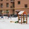 Empty, snow, bright children`s playground