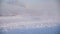 Empty snow covered road in winter landscape. Road covered with snow. on the surface a few tracks, fog and snow in the