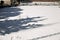 Empty snow covered soccer field in winter