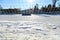 Empty snowy soccerball field