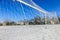 Empty snowy soccerball field