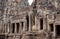 Empty space around towers of the 12th century Bayon temple, Cambodia. Historical walls in Angkor. UNESCO heritage site
