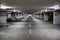 Empty space car park interior at afternoon.Indoor parking lot.interior of parking garage with car and vacant parking lot in parkin