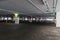 Empty space car park interior at afternoon.Indoor parking lot.interior of parking garage with car and vacant parking lot in parkin