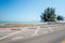 Empty space outdoor asphalt parking lot seaside beach in national park. Transportation and travel