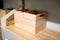 Empty squared wooden container for organizer on modern floating