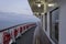 Empty standing chairs on upper deck of ferryboat